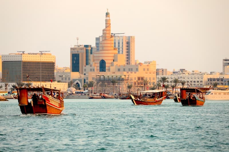 Traditional dhow boats on the water in Doha, Qatar